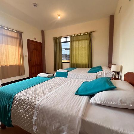 Hostal Casa Cascada ปูแอร์โตอาโยรา ภายนอก รูปภาพ