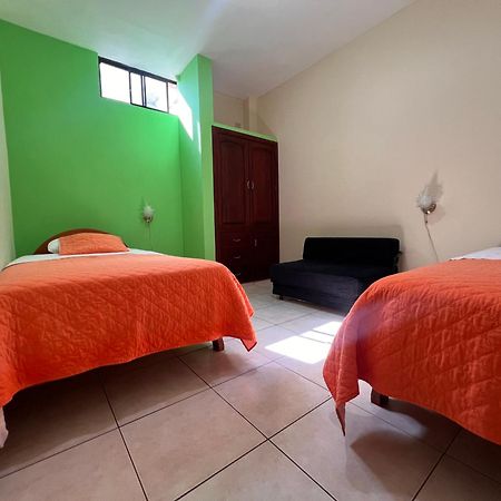 Hostal Casa Cascada ปูแอร์โตอาโยรา ภายนอก รูปภาพ