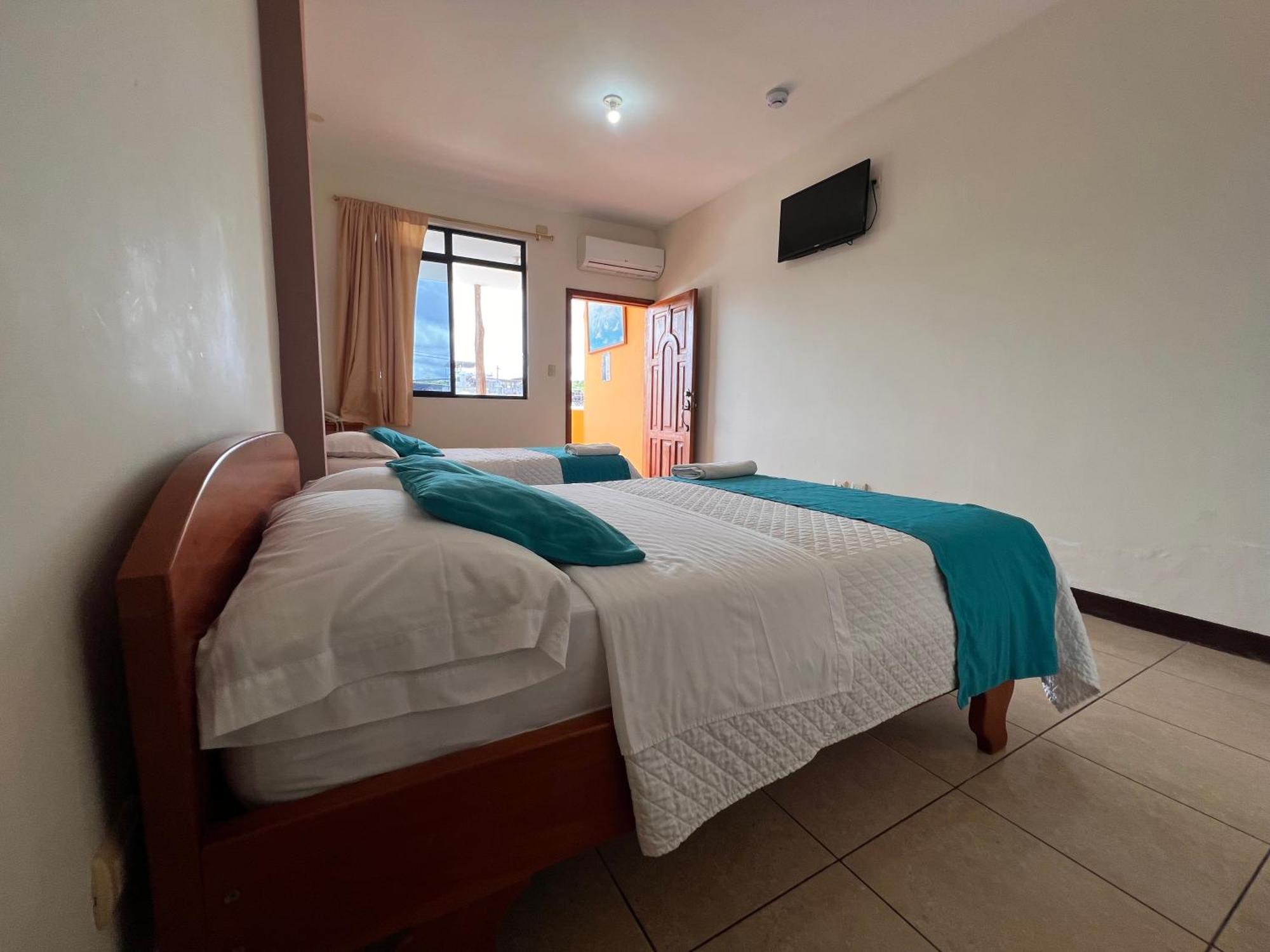 Hostal Casa Cascada ปูแอร์โตอาโยรา ภายนอก รูปภาพ
