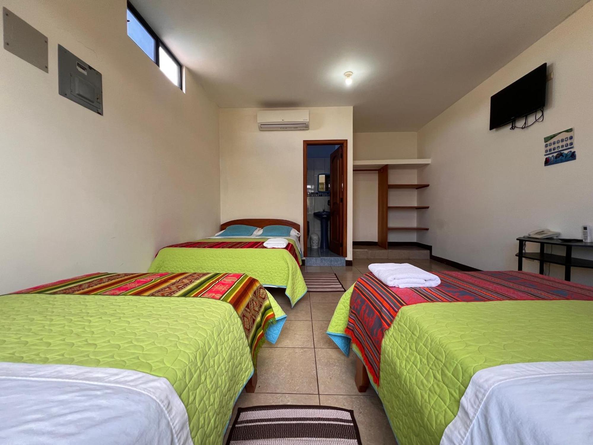Hostal Casa Cascada ปูแอร์โตอาโยรา ภายนอก รูปภาพ
