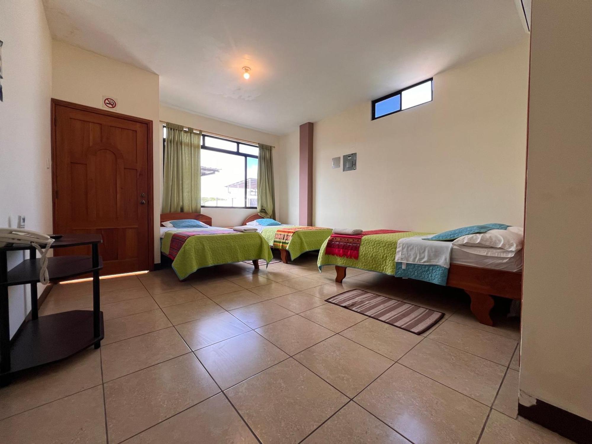 Hostal Casa Cascada ปูแอร์โตอาโยรา ภายนอก รูปภาพ