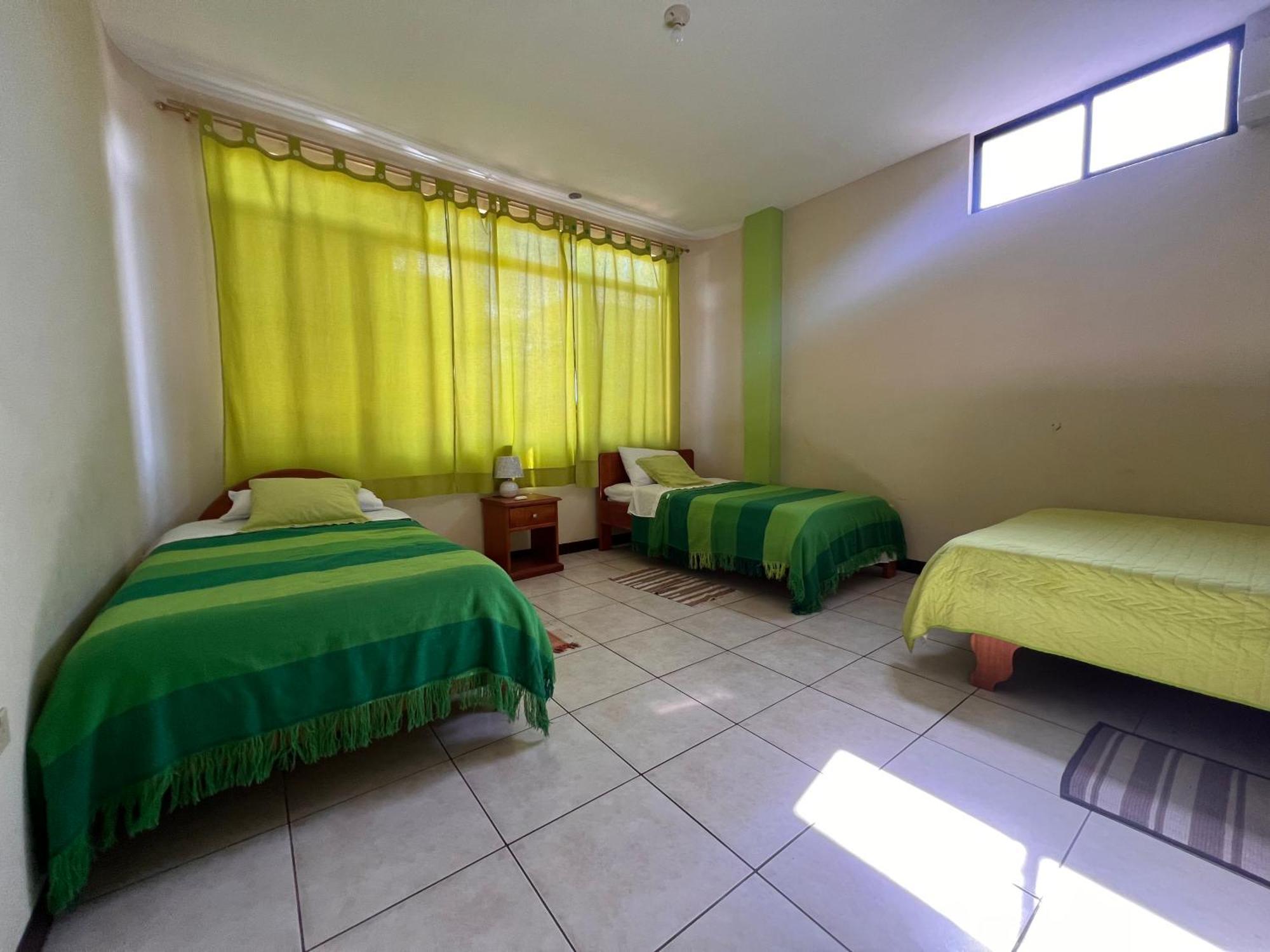Hostal Casa Cascada ปูแอร์โตอาโยรา ภายนอก รูปภาพ