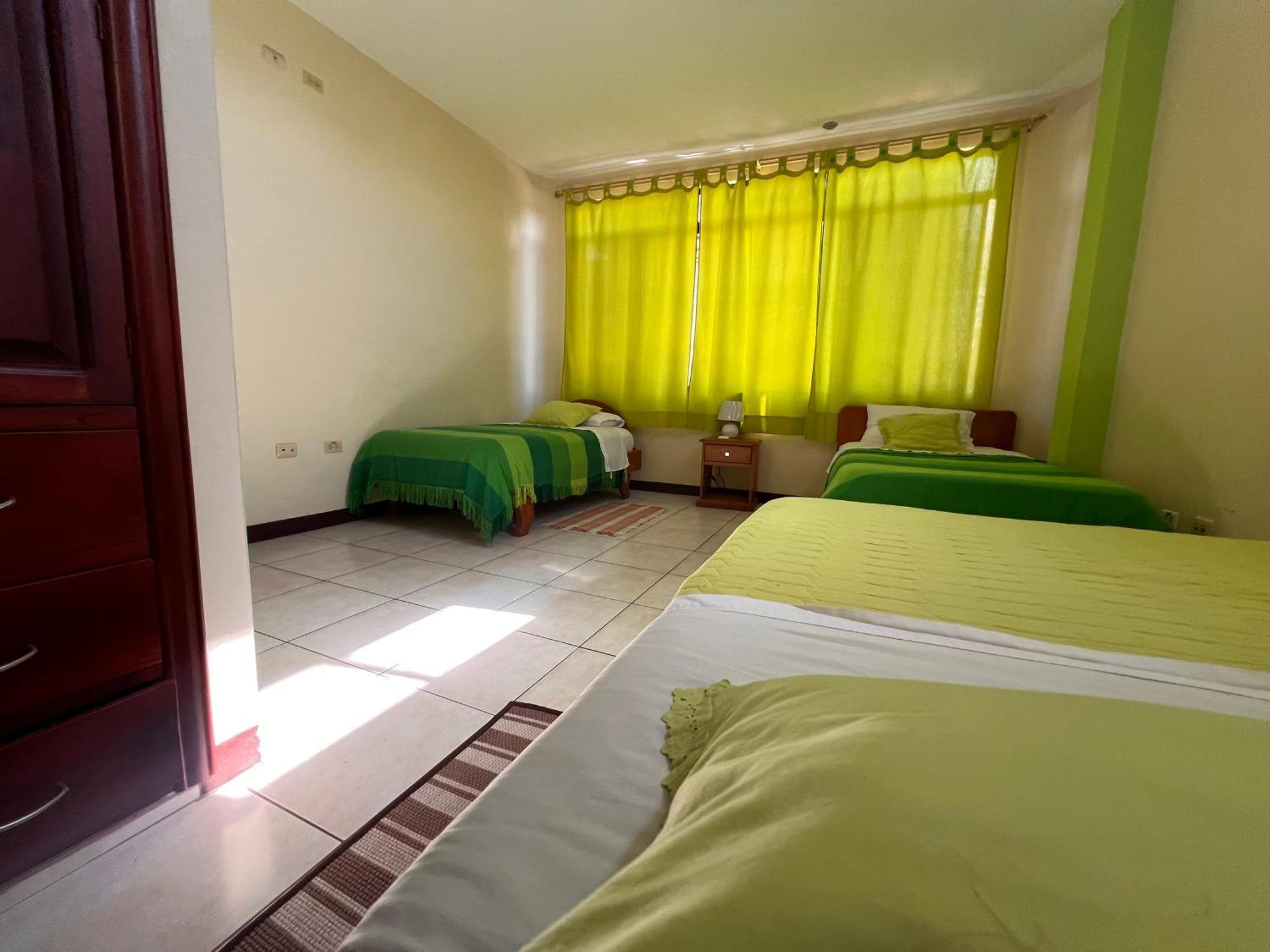 Hostal Casa Cascada ปูแอร์โตอาโยรา ภายนอก รูปภาพ