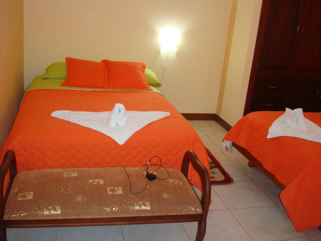 Hostal Casa Cascada ปูแอร์โตอาโยรา ห้อง รูปภาพ
